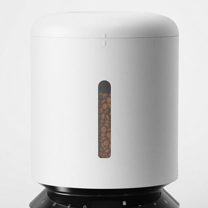 Tail-wagged automatic cat feeder with LED display, voice recording feature, and food dispenser for convenient pet feeding.