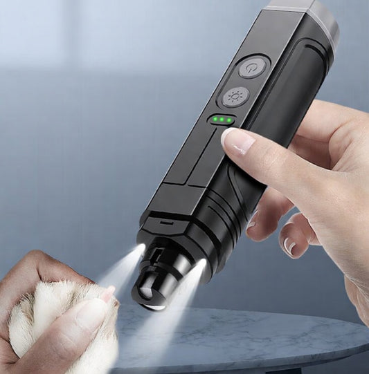 Tail-wagged electric pet nail clipper with LED light, ultra-quiet design, showing a close-up of the grooming tool for safe trimming.